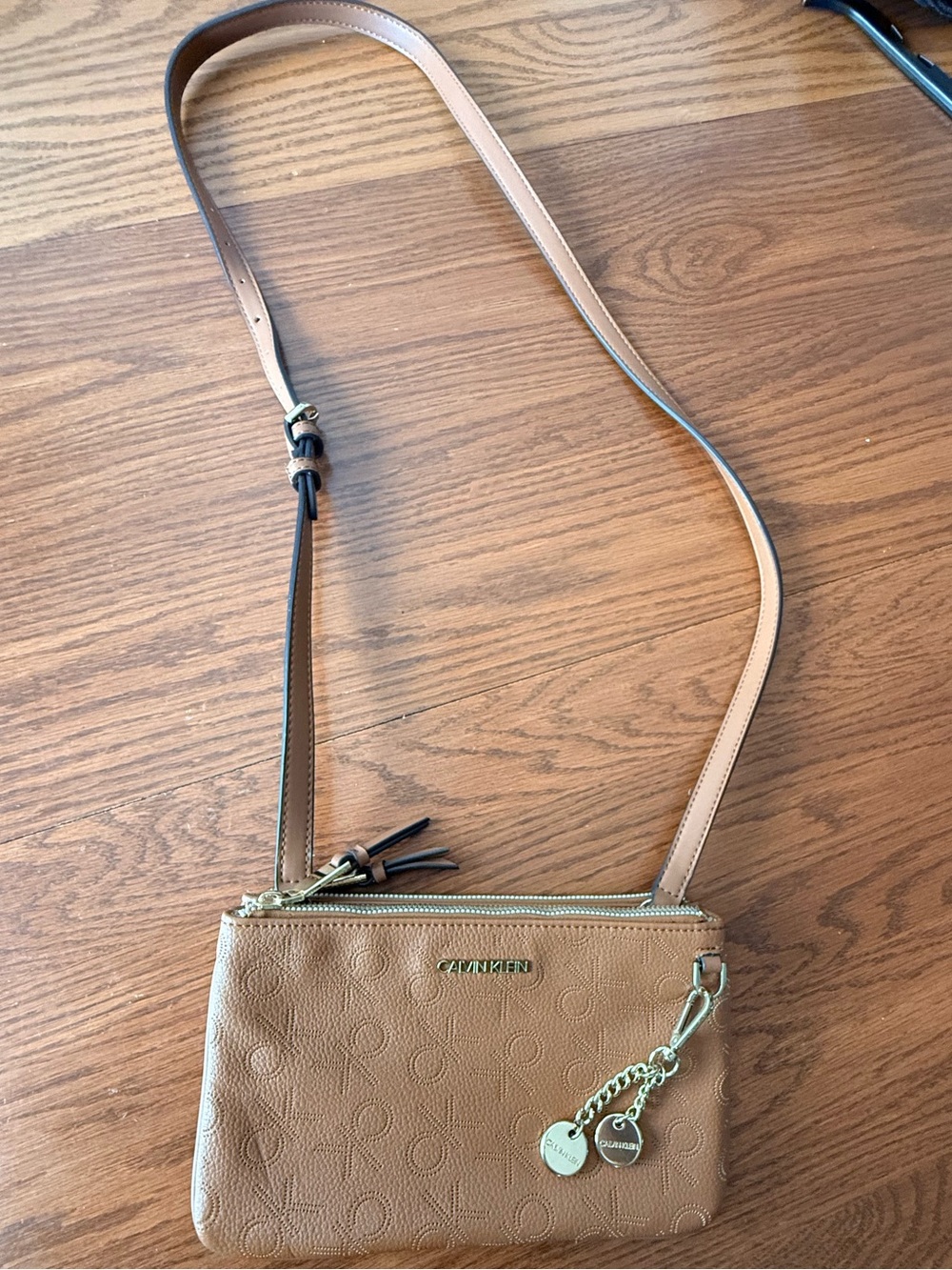 Calvin Klein Tan Double zip pocket Crossbody with Gold Charm Accents